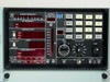 Microdyne 1400-MR front panel display showing center frequency scale, RF frequency, demodulator controls, video bandwidth, and carrier indicator panel