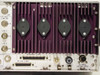 Microdyne 1400-MR rear panel showing RS-232 connector (J26), Accessory connector (J20), power transistors on heatsink, and 120VAC 50-400Hz power input (J1)