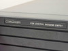 ComStream PSK Digital Modem CM701 nameplate label close-up on front panel bezel