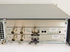 ComStream CM701 rear panel RF section close-up showing BNC connectors labeled J3 TxIF, J4 Tx Loopback, J5 RxIF, J6 Rx Loopback, J7 AGC Monitor, with Modulator 140 MHz and Demodulator 140 MHz module labels and Variable Symbol Rate markings