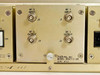 3dbm 50AT-1-2R module rear panel detail showing four BNC connectors labeled RF 1 Input (J1), RF 2 Input (J3), RF 1 Output (J2), RF 2 Output (J4), with 3dbm model and serial number label