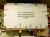 Close-up of WV Communications RF/IF Demodulator sub-assembly inside the unit, label reads P/N RF/IF-DEM-PANAM S/N 101, with SMA connectors labeled LO IN, RF IN, IF OUT, GND, and +12V