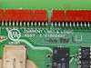 Varian PCB board label close-up showing 'Current Limit & Logic' silkscreen, assembly number E-01000437, and Varian logo