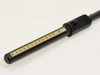 Dynatech DPC-12-1 close-up of single pogo pin connector end showing gold spring contact pins on white substrate