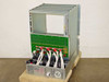 General Instrument CLI Magnitude MPEG Encoder 410111-01 — rear three-quarter view showing backplane PCB, power supply unit, and multi-cable power harness with red and white leads