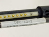 Dynatech DPC-12-3 cable — label on connector reading DPC-12-3 and Dynatech Communications, with gold spring-contact pins visible