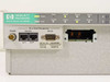 HP J2602A AdvanceStack left-side panel detail showing ThinLAN BNC port, Extension RJ-45 in/out, RS-232 DB-9 out-of-band management port, station address label, and LED indicators