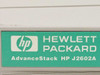 HP J2602A AdvanceStack Hewlett-Packard product label close-up showing model designation on teal nameplate