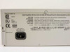 HP J2602A AdvanceStack rear label close-up showing power ratings 100-127V / 200-240V AC 50/60Hz 0.8A, label part number 5182-1718, Made in USA, and FCC/CSA markings