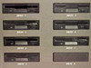 Cubix LCS Resource SubSystem close-up of all 8 TEAC FD-235HF 3.5-inch floppy drive bays labeled Drive 1 through Drive 8