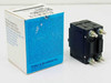 Potter & Brumfield W92-X112-7 2-pole circuit breaker next to original box showing manufacturer text on side panel