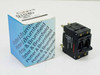 Potter & Brumfield W92-X112-7 circuit breaker shown beside its original blue branded box — front angled view