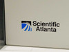 Scientific Atlanta logo detail on front panel of the D-9110 PowerVu encoder chassis