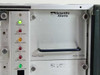 D-9110 interior right side showing D9709 Power Supply module and front panel alarm LEDs