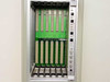 Zarak Abacus 82-00132 card carrier interior – 6-slot card cage backplane with green PCB and card guides, front panel indicators visible at right