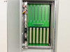 Zarak Abacus 82-00132 card cage interior – alternate angle showing 6-slot backplane with two LAN connectors and wiring harness visible on left