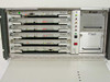 Scientific Atlanta D-9110 PowerVu Digital Multiplexer – front panel open showing installed modules: D9732 Utility Data, three D9730 SWIF Receive, D9740 Conditional Access, D9711 MSYNC Control, and two D9709 Power Supply modules