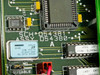 STS D61486-01 PCB close-up showing board markings SCH D54381, ASSY D54380-1 Rev A, Dallas IC, RASCI oscillator 10.240 MHz, and RS2079 chip