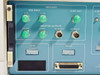 Tau-Tron S5104 rear panel left section — NRZ Input (Data, Clock BNC), PR Sync, Monitor Outputs (M Sync, Bit Errors, BPV Errors BNC), GPIB address DIP switches, RS-232 DB-25 connector