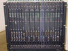 CLI Magnitude front panel showing populated card slots — Audio and Video Compressor module faceplates with LED status indicators and DB-25 monitor connectors