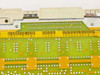 DEC M3119-YA PCB edge – barcode labels showing board revision D06 and serial number AS04436581
