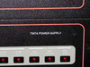 TWTA Power Supply label on upper chassis showing 'ALARMS' section with COVER INTLK, SUMM FAULT, LOW RF PWR, HIGH RF PWR, and REFL PWR LED indicators