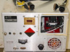 Rear panel of Varian VZC-6965F7 RF assembly showing RF OUT waveguide flange, RF IN port, JSA and JSB D-sub connectors, GND lug, and circular connectors
