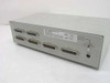 Bravo Communications CPS/1000 Model 1042 rear panel showing four DB25 CPU ports, two device ports, Device Select switch, and power indicator