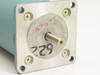 Superior Electric M063-FC06 stepping motor – front shaft face showing 4mm shaft, aluminum flange, and handwritten asset marking 729