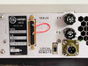 Varian VZC6961D7A1 – rear panel close-up showing rating label, 25-pin D-sub control connector, LOCAL/REMOTE toggle switch, fuse holders F1 and F2, and circular power connector