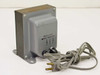 Switchable AC transformer rear view — voltage selector switch and 'Remove Plug Before Switching' label with 105V 115V 125V positions visible