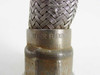 Senior Flexonics brand stamp on hose fitting collar reading SENIOR FLEXONICS NO WRENCH AREA