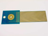 110-147C Rev G DAS Device PCB front view showing teal board with gold finger flex ribbon extending right and radial gold contact array on left