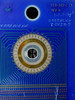 MIR Disk Read/Write Head 110-117C Rev G — reverse side showing part number, revision markings, and full radial gold contact array with numbered pads