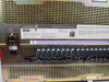 Avaya SD-66984-01 Definity ECS — rear panel close-up showing Lucent Technologies / Definity Enterprise Communications Server label and regulatory markings, DEF ECS CARRIER ASSY identification visible