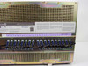 Avaya SD-66984-01 Definity ECS — rear panel lower close-up showing full row of backplane connectors, slot numbering strip, and partial serial/barcode label