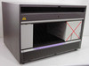 Avaya SD-66984-01 Definity ECS Carrier Card Enclosure — front open showing empty card cage interior with card guides and backplane connectors