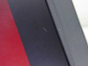 Close-up of Planar PE1700-BK monitor bezel showing a small nick and fine scratch on the lower-left corner of the front frame