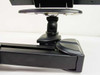Close-up of Kensington K60106 ball-joint pivot mechanism connecting the monitor VESA plate to the articulating arm