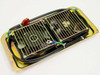 IBM 5699358 dual fan assembly underside view showing protective wire grilles, wiring harness, and connector leads