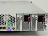 HP ProLiant DL380 rear view showing redundant hot-plug power supply bays with pink handles