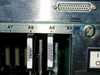 Octel VMX200 card slots A7 through A10 close-up showing cards with barcode labels including part number 300-6039-004R and DB25 connector above