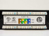 Dynacom CAT 5e patch panel – rear close-up of punchdown block showing CAT 5e label, T568A/T568B wiring diagram, UL Listed, UL Verified, and ETL Verified markings