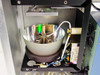Phase Metrics Lamphouse interior view showing Hamamatsu arc lamp installed in polished parabolic reflector bowl with cooling fan visible