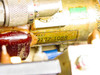 GE EM-1 – close-up of gold cylindrical RF component showing part number 9127-1088 stamped on body, with SMA connector and wiring visible