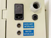 ISA Riber CX 700 rear panel close-up showing 220VAC IEC power inlet, auxiliary interlock connector, water interlock connector, and cable gland