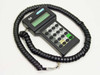 Hypercom S8 PIN pad front view showing LCD display, 16-key alphanumeric keypad, and attached coiled RJ cable