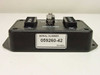 AC Data Systems TJ1010B TVSS – rear/side view showing serial number label 059260-42 and bottom-mounted RJ-48C port