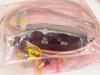 Included cable accessory kit in pink ESD bag showing coax cable and component labeled NO MHA MHA