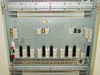 Rolm 9200 PBX chassis – rear panel close-up of middle shelf showing multi-pin connectors, labeled slots, and wiring